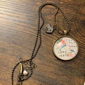 Plunder Bronze Bird Pendant Necklace with Pastel Floral Accents